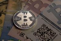 Стоимость Bitcoin впервые за год достигла почти 9 тыс. долларов